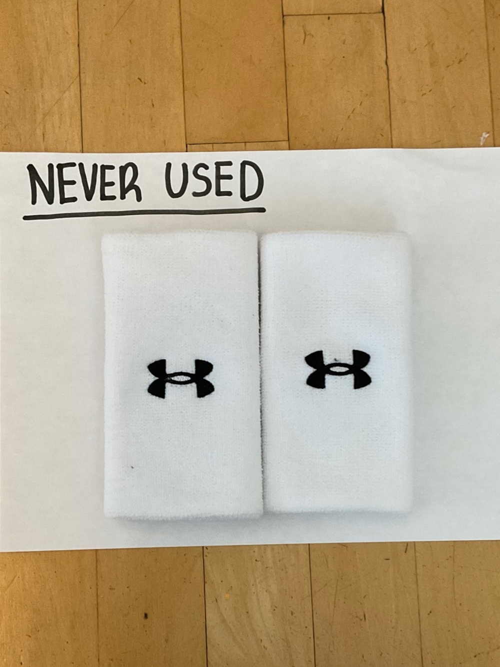 Under Armour White Wristbands with Black Logo
